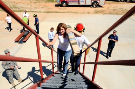 Employees experience firefighter training (6257140761)