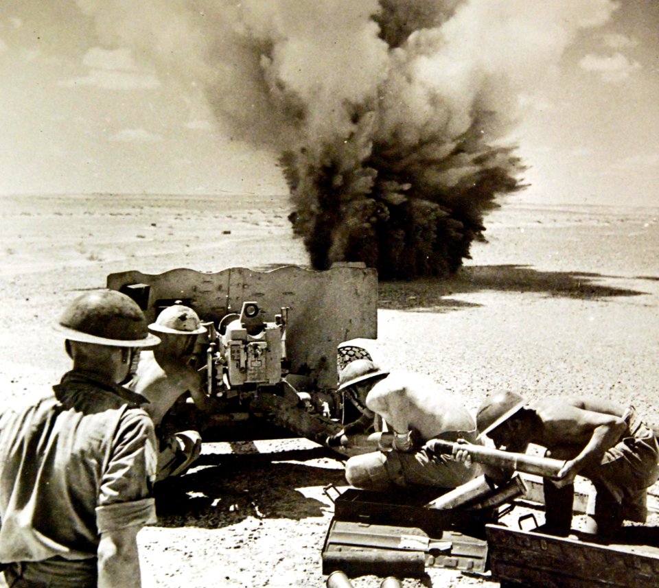Enemy shell landing close to 6-pound gun, North African Campaign, WWII (36845603260)