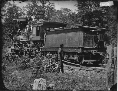 Engine Fred Leach, U.S. Military Railroad, showing marks of cannon shot. - NARA - 529295