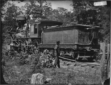 Engine Fred Leach, U.S. Military Railroad, showing marks of cannon shot. - NARA - 529295 photo