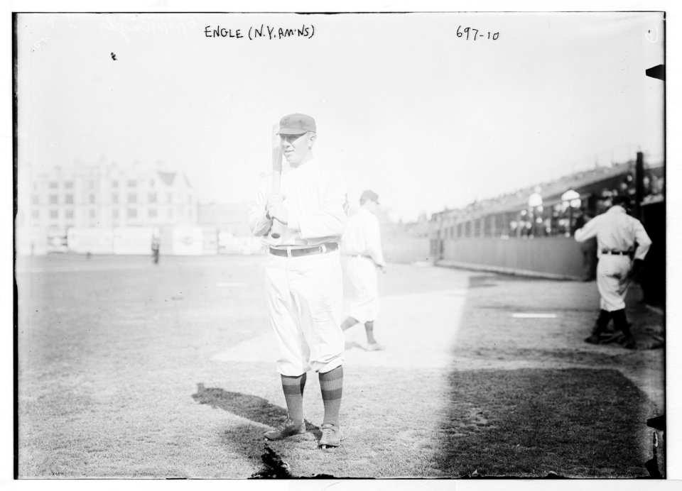 Engle, ballplayer for N.Y. Americans, on field holding bat LCCN2014683326