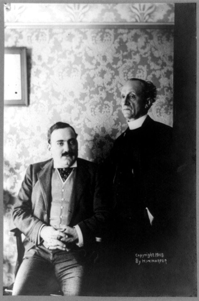 Enrico Caruso, three-quarter length portrait, seated, facing right, with Fr. Tonelli LCCN89714529