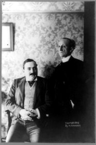 Enrico Caruso, three-quarter length portrait, seated, facing right, with Fr. Tonelli LCCN89714529