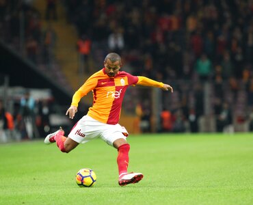 Yellow red football player football