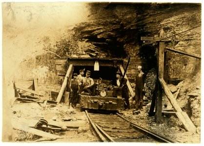 Entrance to a W. Va. coal mine- a 'drift' mine. The live-wire was only shoulder -high in places inside, and unprotected. LOC nclc.01055