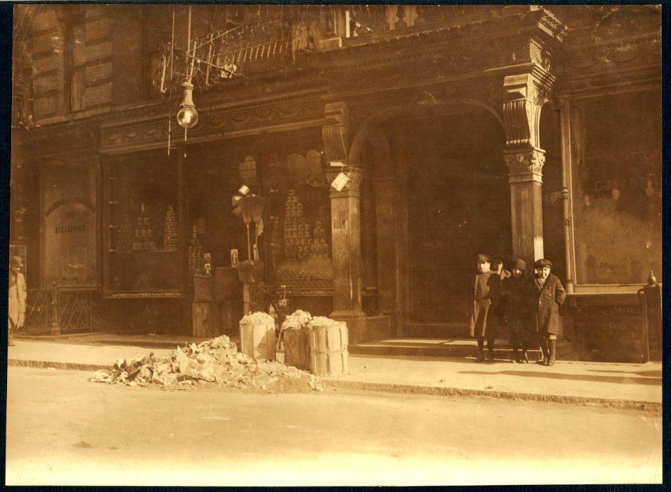 Entrance to licensed tenements, 170-172 Thompson Street, N.Y., where home-work flourishes. LOC cph.3b01105