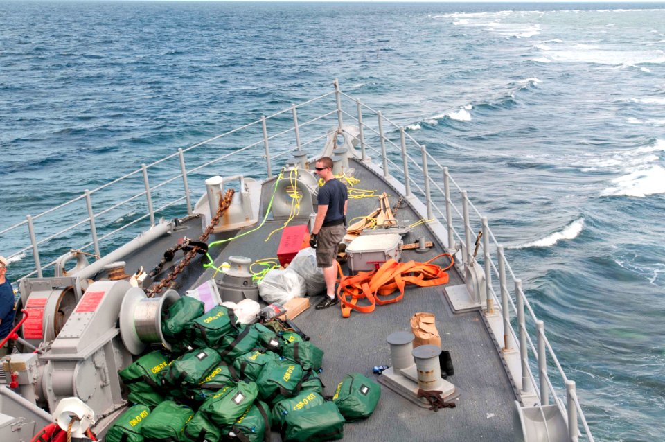 Equipment and material is transferred from USS Guardian. (8430475252)