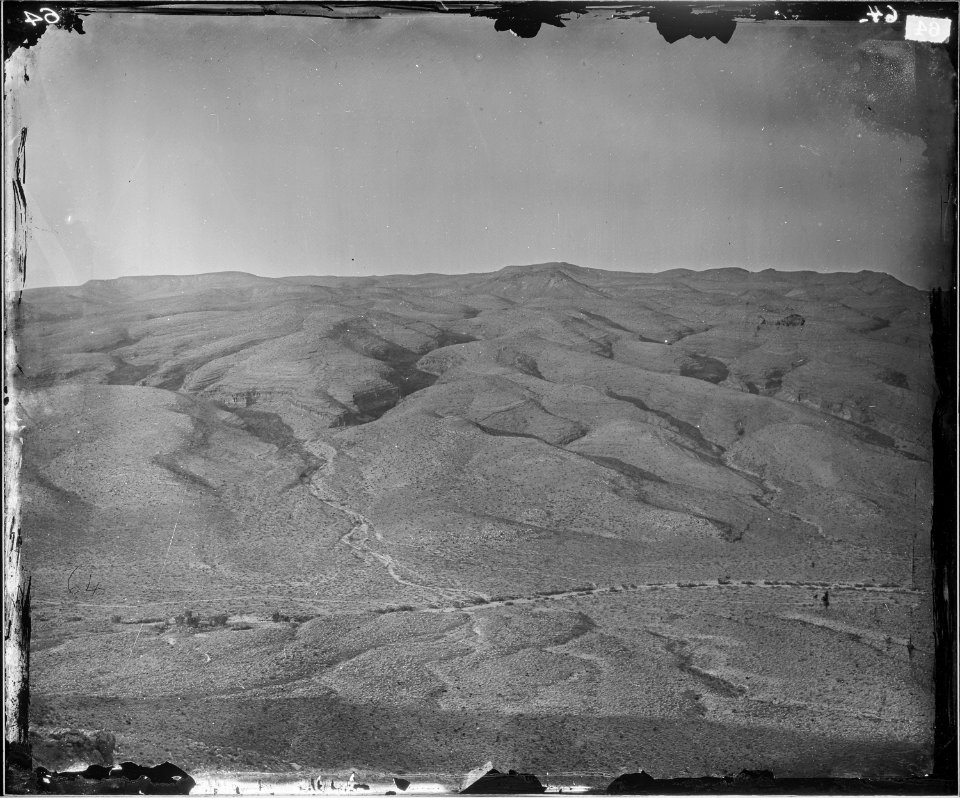 ERODED STRATA NEAR COTTONWOOD SPRINGS, NEVADA - NARA - 524167