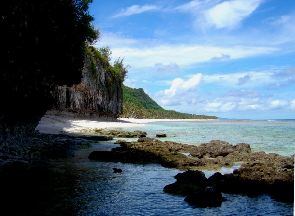 Eroding coral rock and wave undercut cliffs on Guam (line379580818)