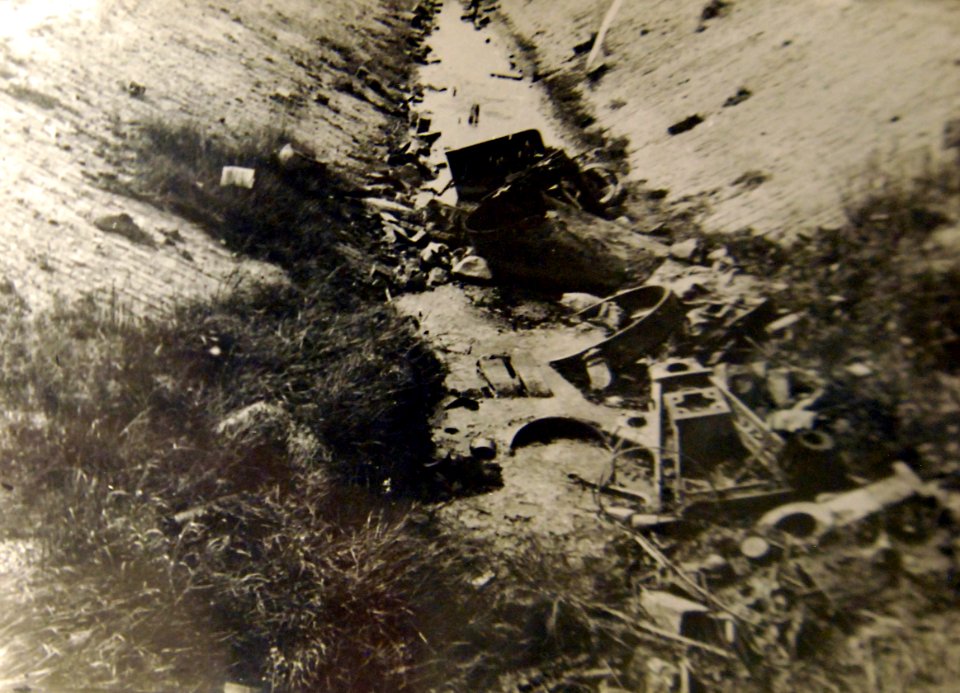 Essential parts of machinery thrown into a canal, France, WWII (32169897311)