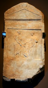 Estela funerària originàriament àtica