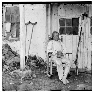 Gettysburg, Pa. John L. Burns, the 'old hero of Gettysburg,' with gun and crutches LOC cwpb.01660