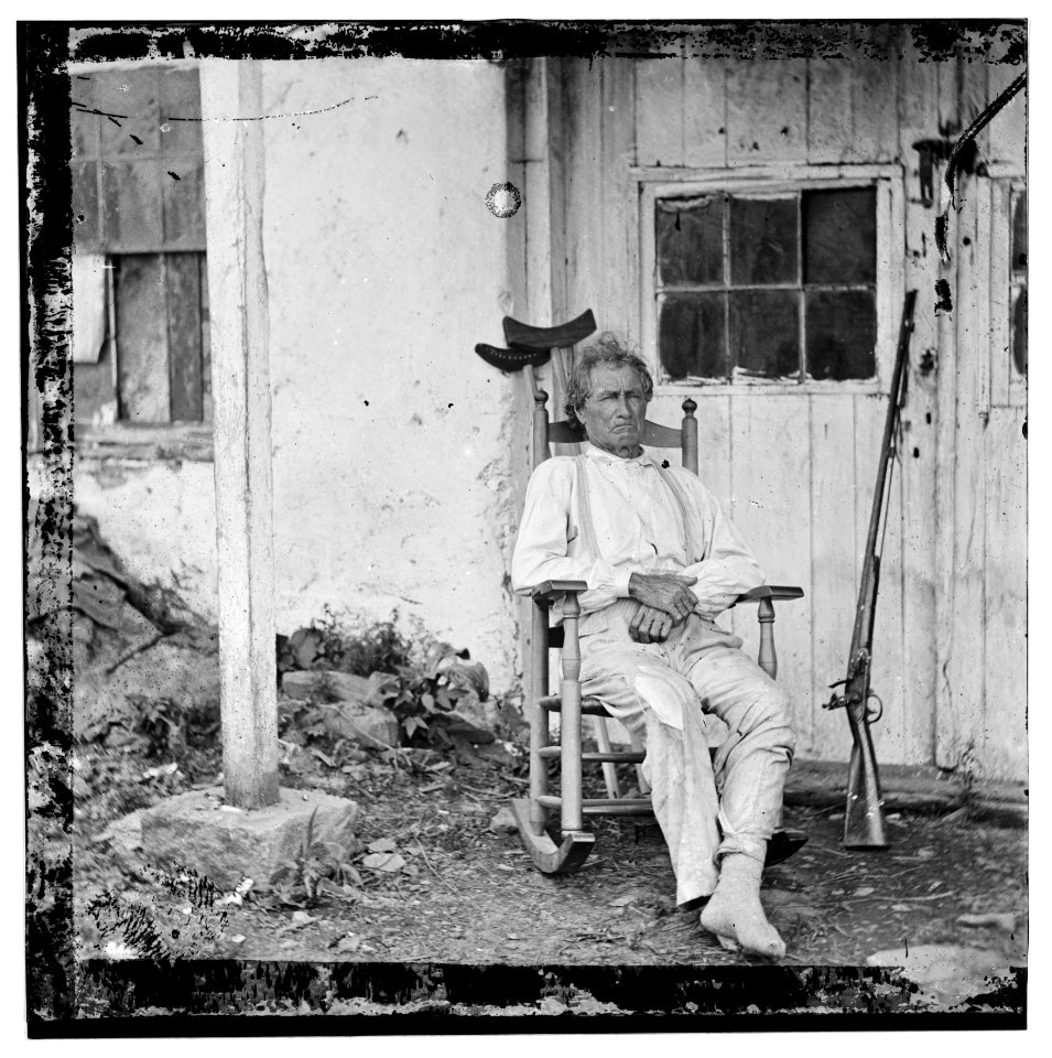 Gettysburg, Pennsylvania. John L. Burns, the 'old hero of Gettysburg,' with gun and crutches LOC cwpb.01657