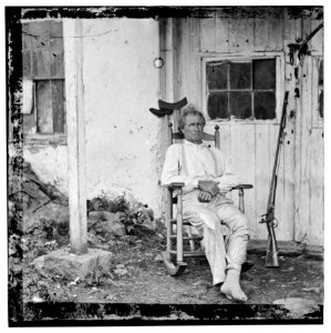 Gettysburg, Pennsylvania. John L. Burns, the 'old hero of Gettysburg,' with gun and crutches LOC cwpb.01657