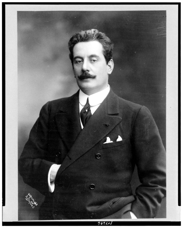 Giacomo Puccini, half-length portrait, standing, facing slightly left, right hand inside coat LCCN93503127