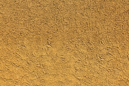 Scratch plaster textured plaster wall