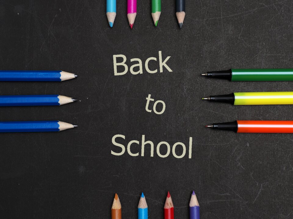 Black board message back to school