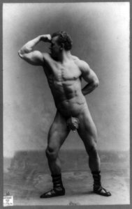 Eugen Sandow, full-length portrait, standing, left profile, wearing fig leaf and flexing muscle with fist raised to forehead LCCN90708835