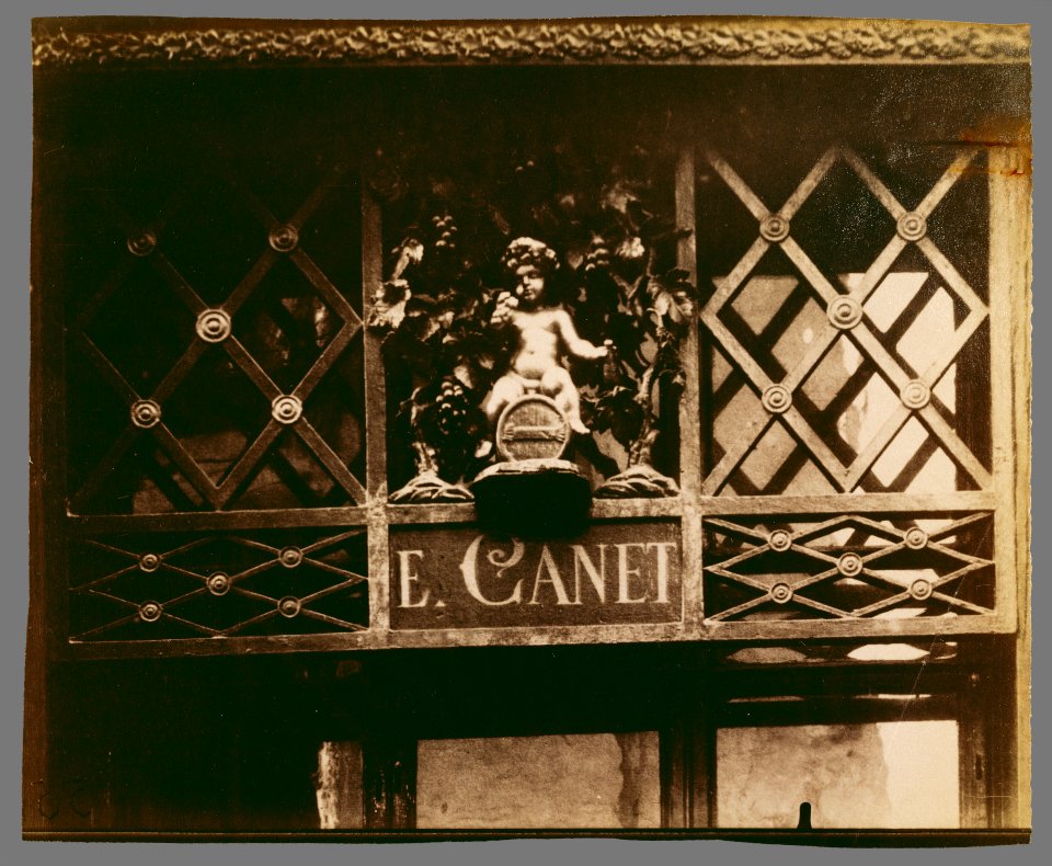 Eugène Atget, Shop Sign, rue Saint-Louis-en-l'Île - Getty Museum