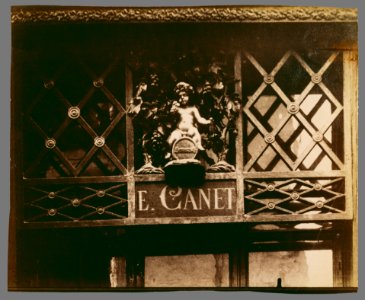Eugène Atget, Shop Sign, rue Saint-Louis-en-l'Île - Getty Museum