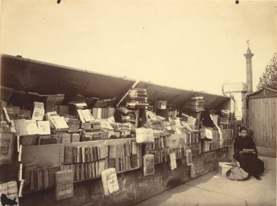 Eugène Atget, Secondhand Book Dealer, place de la Bastille - Getty Museum