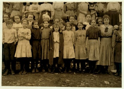 Every one of these children works in Hosiery Mills. The smallest girl in the middle said, 'I ravels and picks up.' Small boy in another mill said, ' Over in Mill they work em so little they LOC nclc.01995