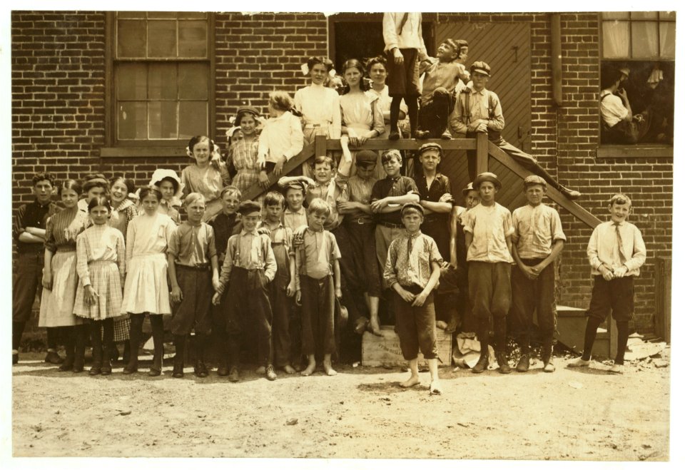 Every one of these youngsters went into work when the whistle blew, noon June 15, 1911. These boys and others work in the Chesapeake Knitting Mills, Berkley, Va. See also photos and labels LOC nclc.02201