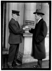 EXAMINING PASS AT STATE DEPARTMENT BUILDING LOC hec.10133