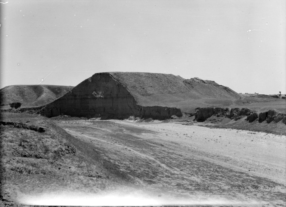 Excavations. Tell Jemmeh, (Gerar). Tell Jemmeh cut by winter torrents. Wady Sharia encroaching on the ancient site LOC matpc.15673