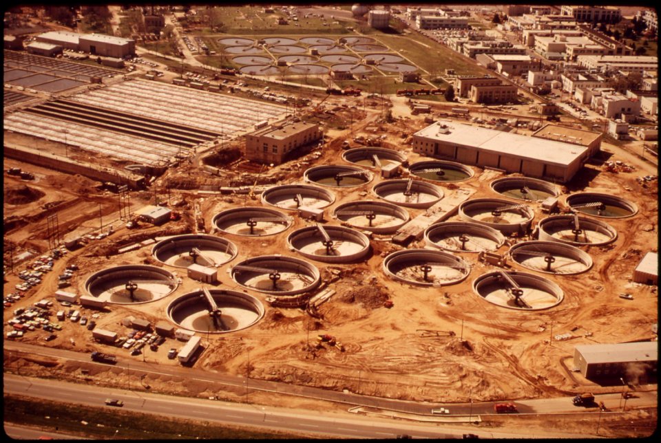 Expansion-of-blue-plains-sewage-treatment-plant-additional-aeration-tanks-are-being-placed-in-cleared-area-in-foreground-april-1973 7461363776 o