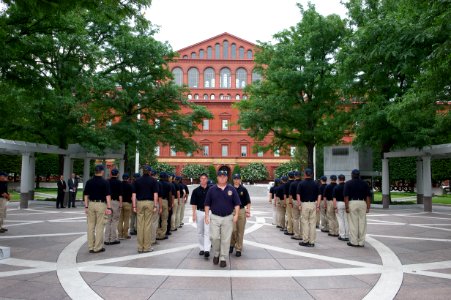 Explorers hosted by U.S. Marshals stand in formation photo