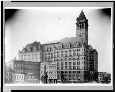 Exterior of Old Post Office, Washington, D.C. and surrounding buildings on south side of 1000 block of Pennsylvania Ave. N.W. LCCN92501139