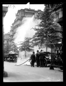 Extinguishing fire or washing building. State, War, and Navy building, Washington, D.C. LCCN2016863138
