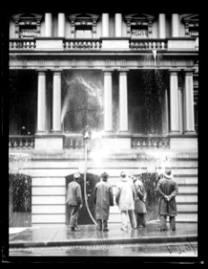 Extinguishing fire or washing building. State, War, and Navy building, Washington, D.C. LCCN2016863137