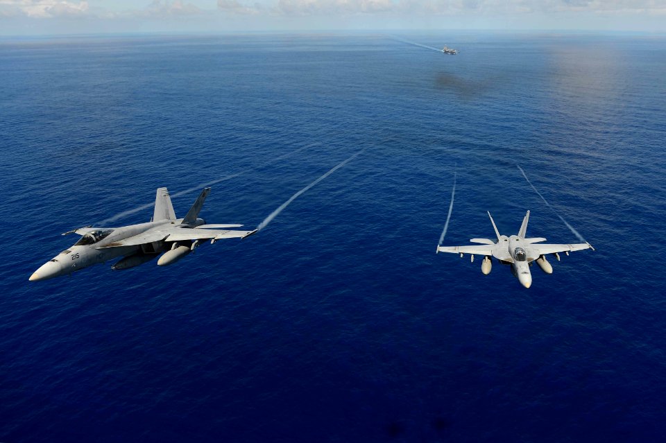 F A-18E Super Hornets participate in an air power demonstration. (8693090558)