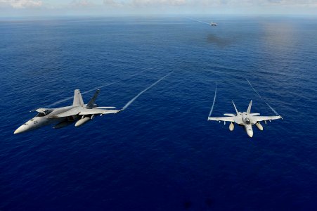 F A-18E Super Hornets participate in an air power demonstration. (8693090558)