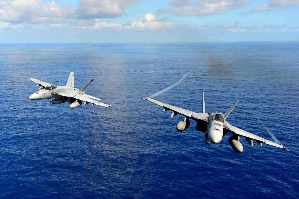 F A-18 Hornets demonstrate air power. (8683136803)