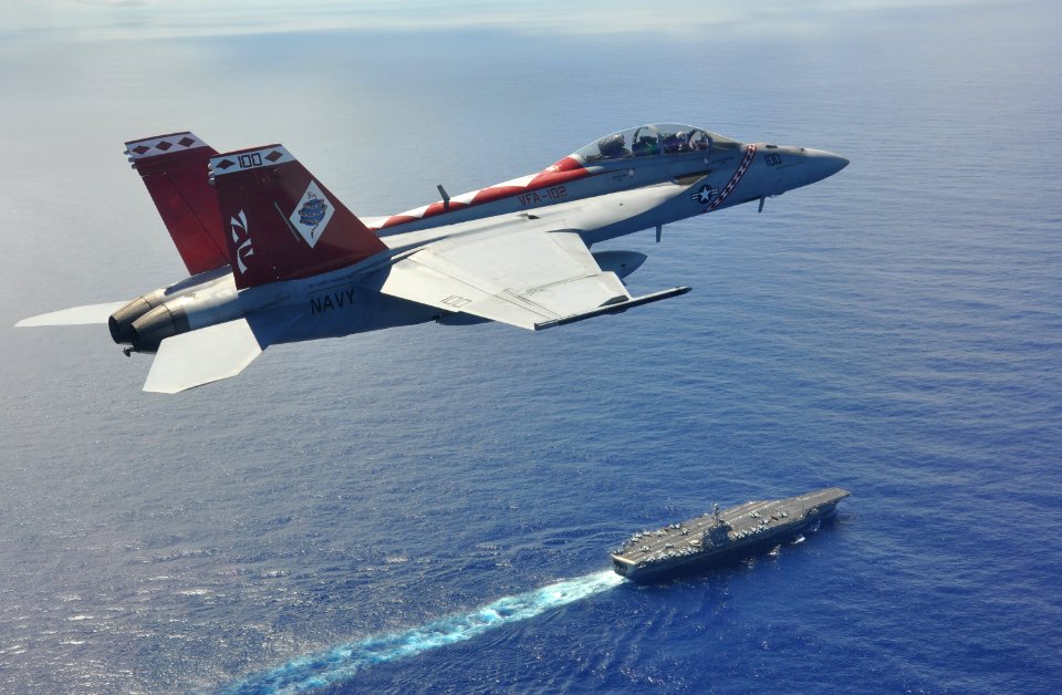 F A-18F flies above USS George Washington in Philippine Sea. (9568001195)