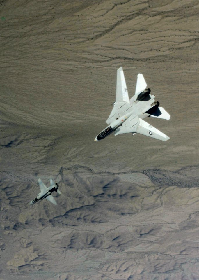 F-14A of VF-143 chases VF-43 T-38A c1980