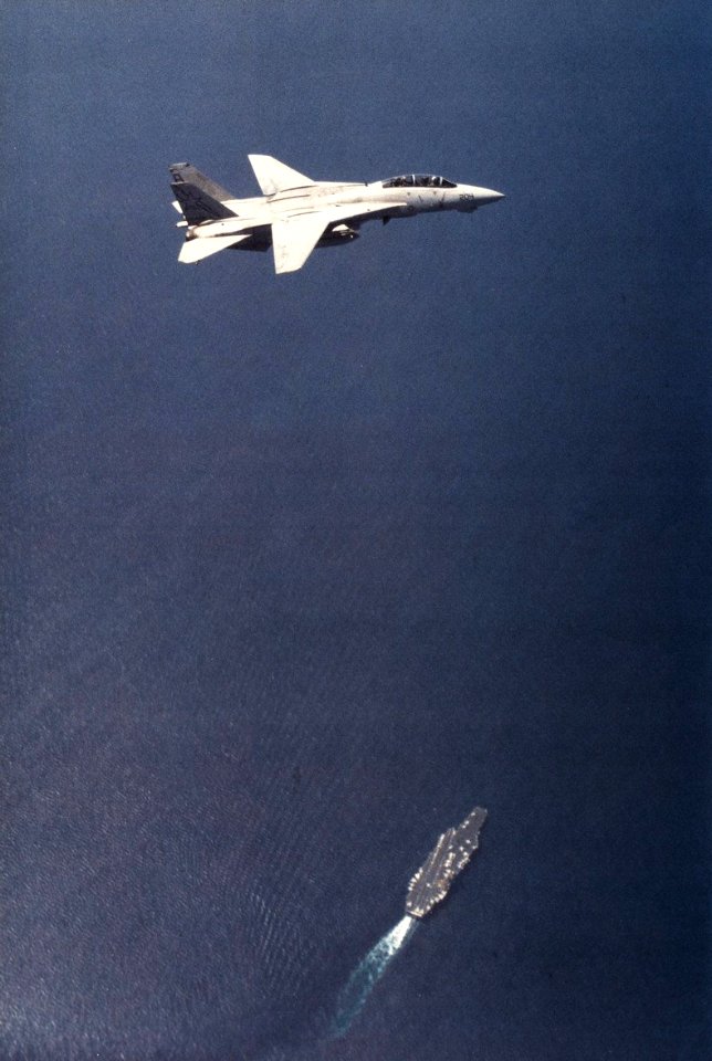 F-14A of VF-33 over USS America (CV-66) in 1991