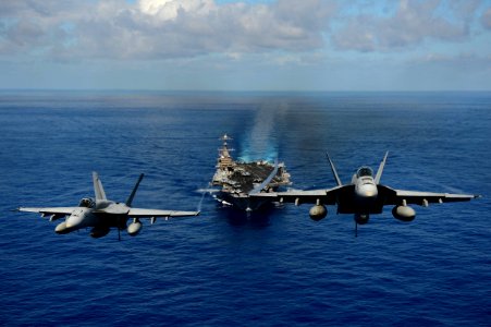 F A-18 Hornets demonstrate air power. (8683136925)