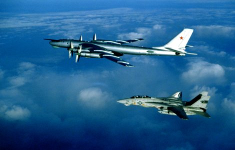 F-14A Tomcat of VF-1 escorts a Tu-95 over the Pacific Ocean on 6 March 1987