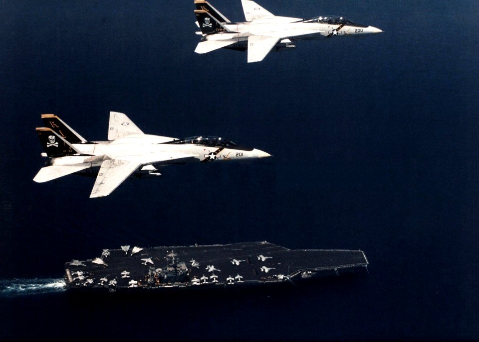 F-14As VF-84 flying over USS Theodore Roosevelt (CVN-71) 1989