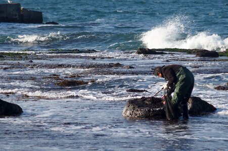 Coastal rock fishermen photo