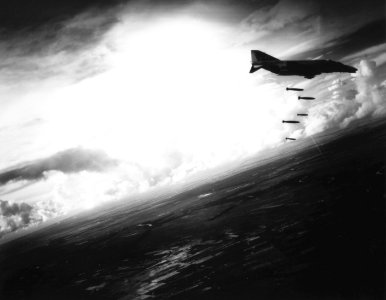 F-4B Phantom of VF-21 drops bombs over South Vietnam in October 1965