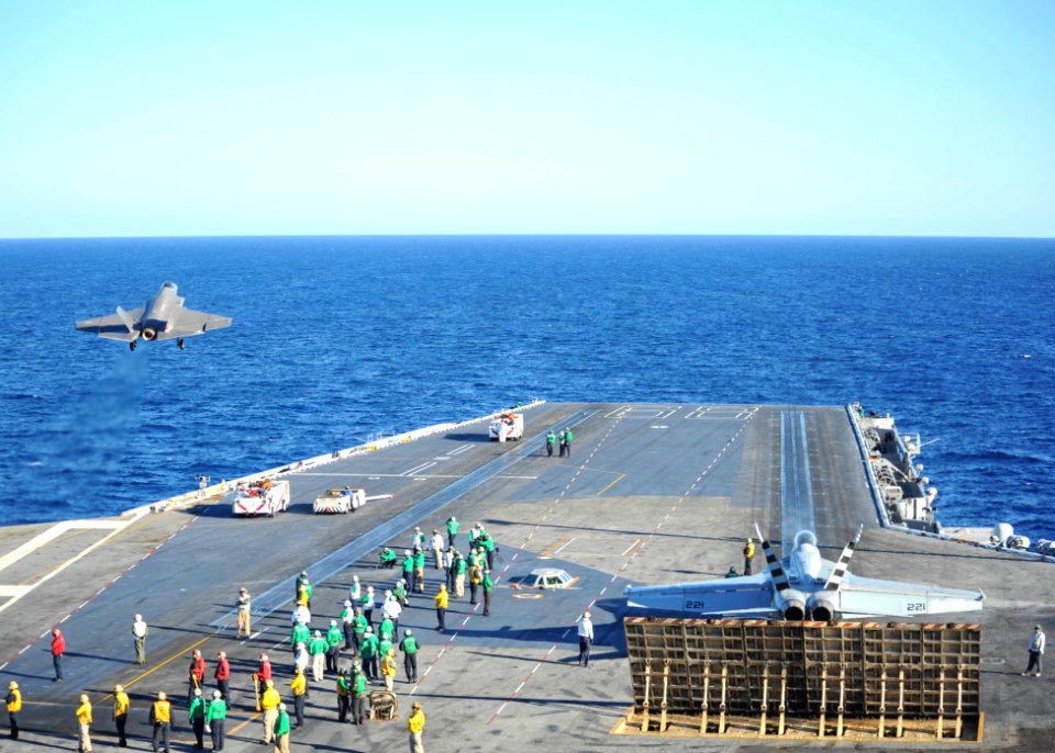 F-35C Lightning II conducts 1st carrier launch 141104-N-UV347-108