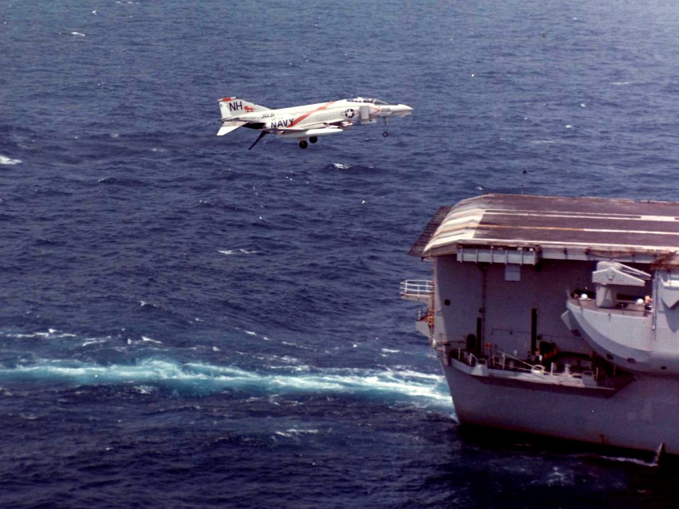 F-4B Phantom II of VF-114 lands on USS Kitty Hawk (CVA-63) on 27 April 1969 (NNAM.1996.253.7281.023)