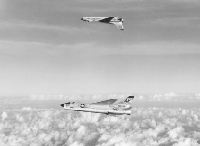 F-8E Crusaders of VF-62 fly practice opposed horizontal rolls c1964