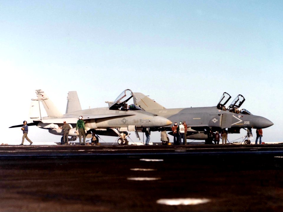 F-4S of VF-302 and F-18A of VX-5 on aircraft carrier 1982