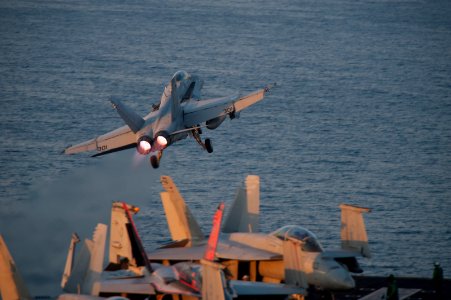 F-A-18C Hornet launches from USS Carl Vinson 141112-N-TP834-146